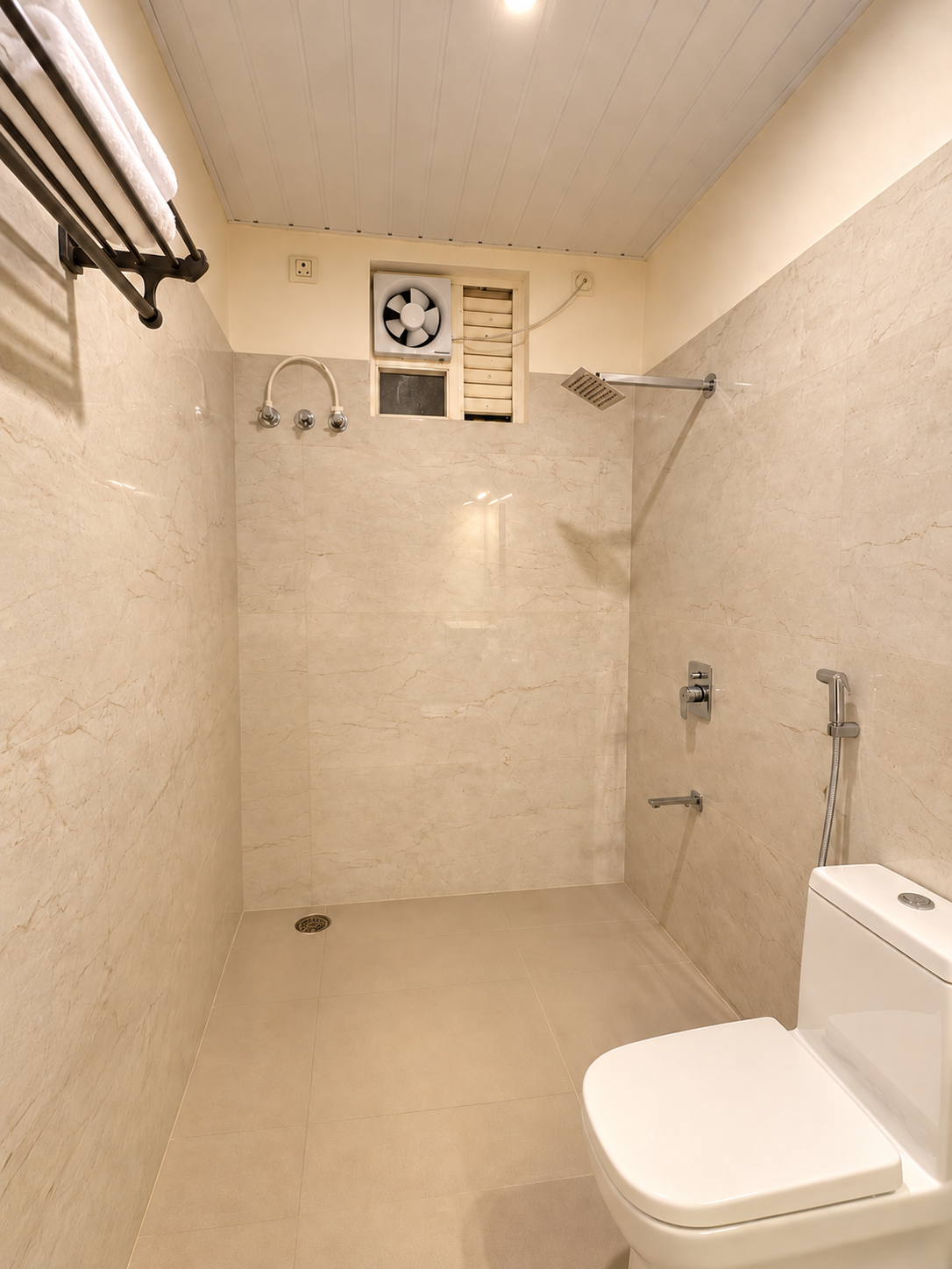 Serene bathroom with one tiny potted plant